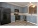 Modern kitchen with stainless steel appliances, ample cabinet storage, and updated countertops at 4938 Sunset Ridge Ct, Charlotte, NC 28269