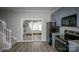 Well-lit kitchen featuring modern appliances, ample counter space, and sliding glass door access at 4938 Sunset Ridge Ct, Charlotte, NC 28269