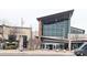 Modern shopping center exterior with glass facade and inviting entrance at 4938 Sunset Ridge Ct, Charlotte, NC 28269