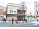 Exterior view of Starbucks with drive thru and outdoor seating at 4938 Sunset Ridge Ct, Charlotte, NC 28269