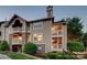 Exterior shot of the apartment complex, showing the balconies and landscaping at 5009 Sharon Rd # E, Charlotte, NC 28210
