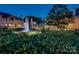 Elegant fountain surrounded by lush greenery enhances the property's curb appeal at 5009 Sharon Rd # E, Charlotte, NC 28210