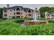 Stunning fountain in front of a well-maintained building, enhancing the overall appeal of the property at 5009 Sharon Rd # E, Charlotte, NC 28210