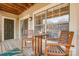 Relaxing patio area with ample natural light streaming through the windows creating a warm atmosphere at 5009 Sharon Rd # E, Charlotte, NC 28210