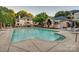Community pool and outdoor amenity area for residents at 5009 Sharon Rd # E, Charlotte, NC 28210
