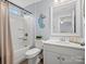 Bathroom featuring a shower-tub combination, toilet and white vanity sink, great for guests at 5013 Hamilton Mill Dr, Waxhaw, NC 28173