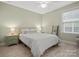 Cozy bedroom featuring a ceiling fan and natural light, ideal for a relaxing retreat at 5013 Hamilton Mill Dr, Waxhaw, NC 28173