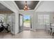 Welcoming foyer with natural light, an open floor plan, and elegant finishes with entry to office and dining room at 5013 Hamilton Mill Dr, Waxhaw, NC 28173