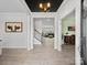 Bright foyer with an open floor plan leading to the living area and staircase at 5013 Hamilton Mill Dr, Waxhaw, NC 28173
