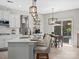 Bright kitchen with quartz countertops, pendant lighting, and stainless steel appliances at 5013 Hamilton Mill Dr, Waxhaw, NC 28173
