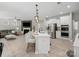 Beautiful open kitchen with an island, stainless steel appliances, and living area at 5013 Hamilton Mill Dr, Waxhaw, NC 28173