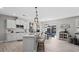 Beautiful kitchen with a modern island, barstool seating, and open layout at 5013 Hamilton Mill Dr, Waxhaw, NC 28173