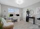 Bright home office featuring a desk and chair with natural lighting, perfect for productivity at 5013 Hamilton Mill Dr, Waxhaw, NC 28173