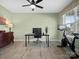 Bright office with a ceiling fan, hardwood floors, and plenty of natural light, perfect for a home workspace at 5013 Hamilton Mill Dr, Waxhaw, NC 28173