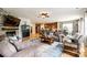 Open floor plan showcases the living room, kitchen, and dining area, perfect for modern living at 5025 Kinross Ln, Indian Land, SC 29707