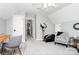 Large bedroom featuring vaulted ceilings, a chair, workout equipment, and natural light at 516 Aspen Ln, Indian Trail, NC 28079