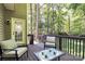 Comfortable deck area with outdoor seating and lush green surroundings at 516 Aspen Ln, Indian Trail, NC 28079