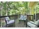 Comfortable deck area with outdoor seating and lush green surroundings at 516 Aspen Ln, Indian Trail, NC 28079