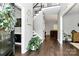Inviting foyer with hardwood floors, staircase, and stylish decor at 516 Aspen Ln, Indian Trail, NC 28079