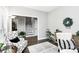 Cozy living room with hardwood floors and lots of plants at 516 Aspen Ln, Indian Trail, NC 28079