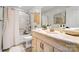 Bathroom featuring a shower-tub combo, vanity, and a neutral color palette at 5428 Barnsdale Ln, Mint Hill, NC 28227