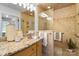 Beautiful bathroom with granite countertop, decorative accents, and tiled shower at 5428 Barnsdale Ln, Mint Hill, NC 28227