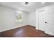 Bright bedroom with hardwood floors, natural light, and ample closet space at 5428 Barnsdale Ln, Mint Hill, NC 28227