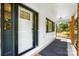 Covered front porch and modern front door of this lovely updated house at 5428 Barnsdale Ln, Mint Hill, NC 28227