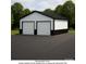 A modern garage with two doors and black and white siding at 5428 Barnsdale Ln, Mint Hill, NC 28227