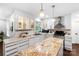 Updated kitchen featuring modern appliances and stone countertops at 5428 Barnsdale Ln, Mint Hill, NC 28227