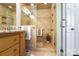 Elegant bathroom with tiled shower, glass door, and updated fixtures at 5428 Barnsdale Ln, Mint Hill, NC 28227
