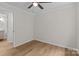 Small bedroom with wood-look floors has an open view to the bathroom at 565 Vine Arden Dr, Salisbury, NC 28146