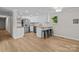 Modern kitchen with stainless steel appliances, butcher block countertops, and breakfast bar at 565 Vine Arden Dr, Salisbury, NC 28146
