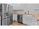 Modern kitchen with stainless steel appliances, butcher block countertops, and a farmhouse sink at 565 Vine Arden Dr, Salisbury, NC 28146