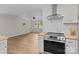 Modern kitchen with stainless steel appliances and a view into the living space at 565 Vine Arden Dr, Salisbury, NC 28146
