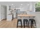 Kitchen featuring stainless steel appliances, butcher block countertops, and a breakfast bar at 565 Vine Arden Dr, Salisbury, NC 28146