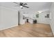 Bright, open living space blending seamlessly with a modern kitchen featuring a breakfast bar at 565 Vine Arden Dr, Salisbury, NC 28146