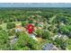 Aerial view showcases home's prime location within a lush, green community, near a golf course at 5806 Bentway Dr, Charlotte, NC 28226