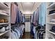 Spacious walk-in closet with custom shelving and rods, providing ample storage for clothing and accessories at 5806 Bentway Dr, Charlotte, NC 28226