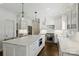 Spacious kitchen features a large island, stainless steel appliances, and ample counter space at 5806 Bentway Dr, Charlotte, NC 28226