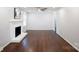 Spacious living area featuring a cozy fireplace at 6100 Ashcrest Dr, Charlotte, NC 28217