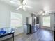 Modern kitchen with stainless steel appliances, stylish cabinetry, and ample natural light, a chef's delight at 6124 Coach Hill Ln, Charlotte, NC 28212
