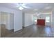 Bright living room with neutral walls, hardwood floors, and a charming fireplace, perfect for relaxing or entertaining at 6124 Coach Hill Ln, Charlotte, NC 28212
