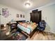 Fun bedroom with a gaming theme, complete with posters, a gaming chair and decorations at 6604 Plyler Mill Rd, Monroe, NC 28112