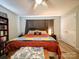 Spacious primary bedroom featuring neutral walls, and a wood accent wall at 6604 Plyler Mill Rd, Monroe, NC 28112