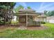 Backyard with a covered patio and outdoor kitchen at 6640 Autumn Gate Ln, Charlotte, NC 28216