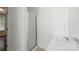 Bathroom featuring a glass-enclosed shower and a sink with chrome fixtures at 6640 Autumn Gate Ln, Charlotte, NC 28216