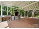 Outdoor kitchen includes a barbecue and counter space under a pavilion at 6640 Autumn Gate Ln, Charlotte, NC 28216