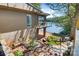 A private backyard area features a brick patio, wrought iron furniture, and stunning water views at 6664 Lake Shore Dr, Hickory, NC 28601