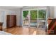 Bright bedroom with hardwood floors, pool view and access to deck at 6664 Lake Shore Dr, Hickory, NC 28601